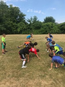 campers playing flag football