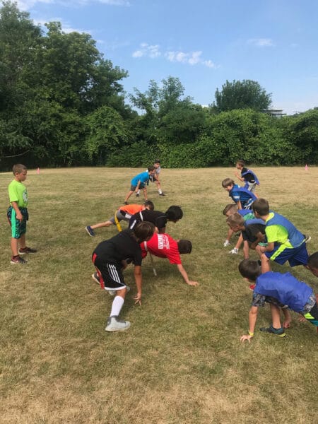 campers playing flag football