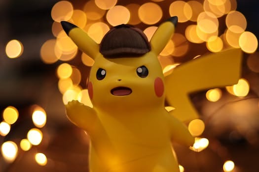 pexels-photo-1716861-1716861 A close-up of a Pikachu figurine illuminated by a warm bokeh effect, creating an eye-catching visual.
